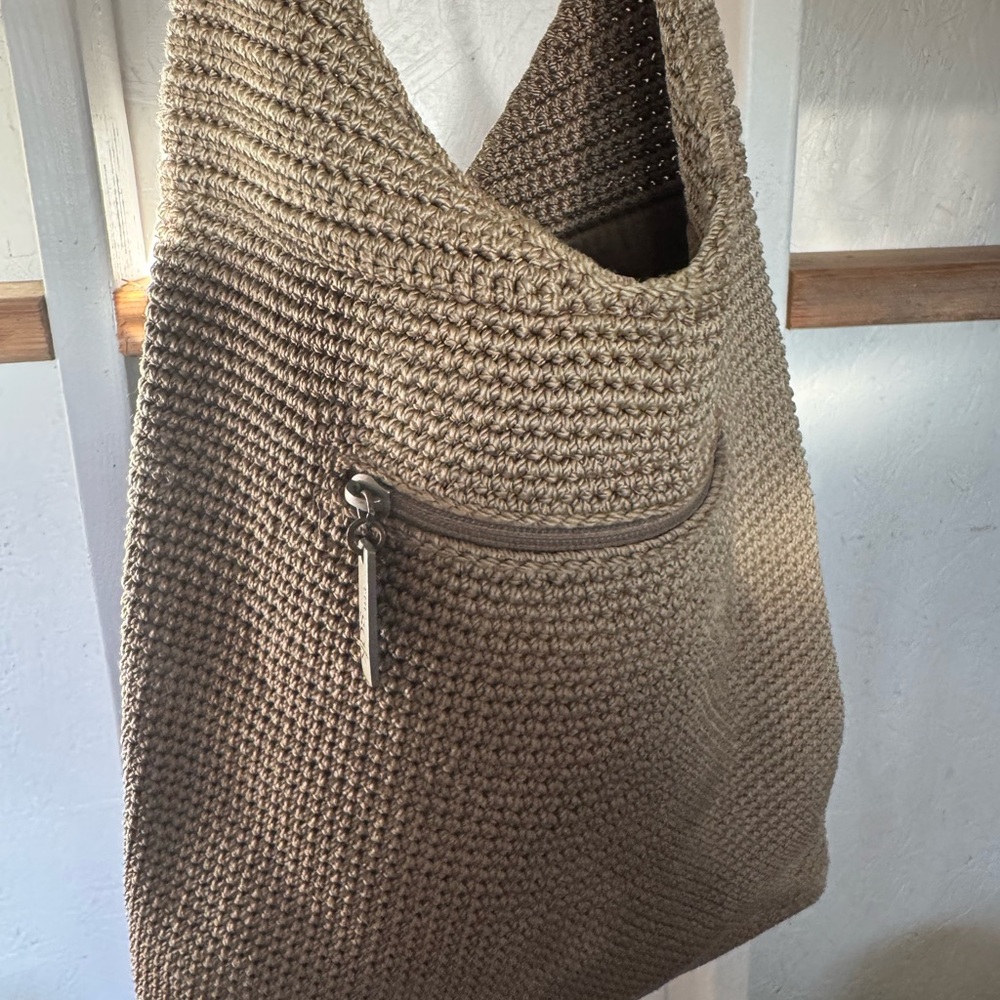 The Sak Tan Crochet Hobo Bag with Slouchy Design